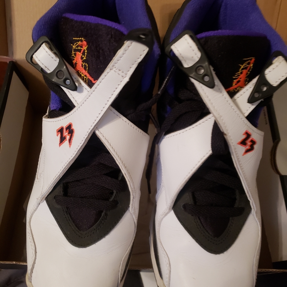Purple,white and black jordans